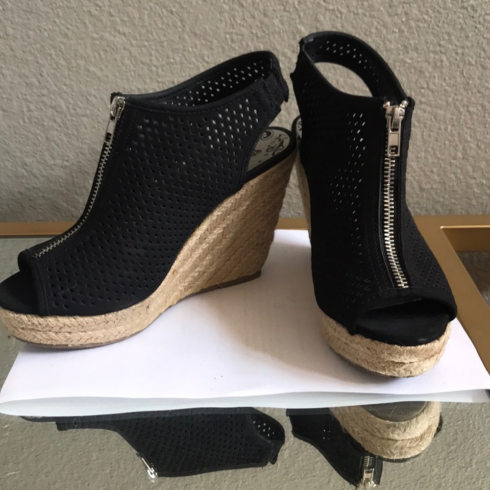 Black wedges with straw heel. Size 6